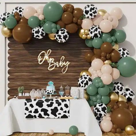 8ft Cow Balloon Garland Arch,First Rodeo Birthday,Retro Cowboy Party,Yeehaw Western Farm Party Wild West Birthday,Barnyard Cow Baby Shower  Listing includes: 8ft long garland  An Assortment of 18-inch,12-inch, 10-inch and 5-inch  18inch in khaki and Sage 12inch  in Cow Print  10inch and 5inch in Khaki brown, gold ,beige, and Sage green  balloon strip to attach the balloons  glue dots instructions  * Material: Latex * All balloons will be shipped flat. Please contact me with any questions or requ Dady Days, Western Theme Baby Shower Ideas, Cow Garland, Cow Balloon Garland, Cowboy Baby Shower Theme, Wild West Birthday Party, Cow Baby Shower Theme, Baby Peacock, Cow Birthday Party