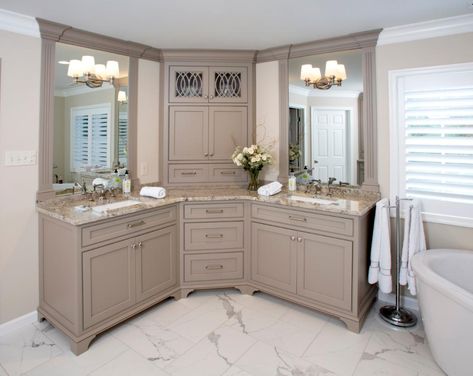 Custom corner double vanity was installed in this award winning bathroom renovation. This project was recognized as the winner of the NARI 2019 CoTy Regional award winner for Residential Bathrooms in the North East.  #BathRemodel #HomeRemodeling #Remodeling #Renovation #Bath #CustomBathroom #DesignBuild  #customremodeling #interiordesign #CustomRemodeling #Design #remodeling #CustomBathDesign #BathRemodel #HomeRemodeling #Remodeling #Renovation #Bath #brettkingbuilder Master Bathrooms With Corner Vanity, Corner Sink Master Bath, Angled Vanity Bathroom, Corner Vanity Bathroom Double Sinks, Double Vanity Corner, Double Corner Vanity Bathroom, Corner Vanity Bathroom Double Sinks Master Bath, Corner Vanity Cabinet Master Bath, Corner Double Vanity Bathroom