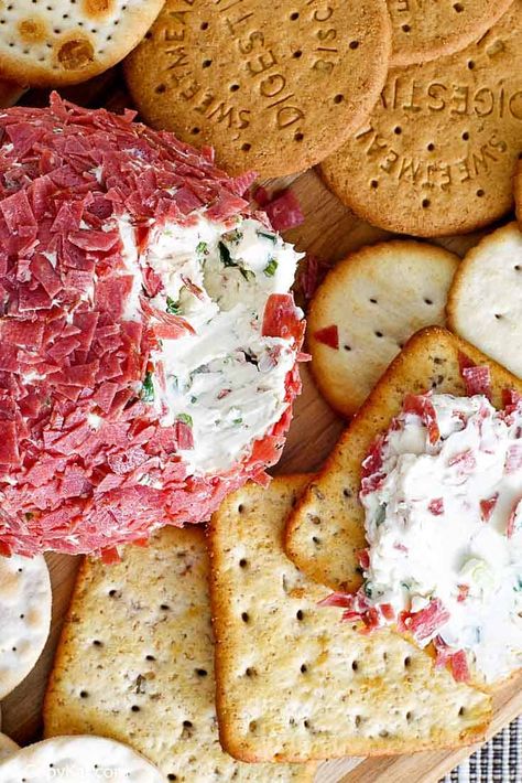 Dried Beef Cheeseball is one of the best appetizers for parties, holidays, and game night. This easy recipe has only 5 simple ingredients. Make this tasty cheeseball with cream cheese, dried beef, green onions, Worcestershire sauce, and pepper. It's low carb and keto friendly. #cheeseball #appetizerrecipes #appetizerideas #lowcarbrecipes #ketorecipes #holidayrecipes #partyfood #gamedayfood Dried Beef Cheeseball, Dried Beef Cheeseball Recipes, Best Appetizers For Parties, Beef Cheeseball, Dried Beef Cheese Ball, Beef Cheese Ball, The Best Appetizers, Cheese Ball Recipes Easy, Cream Cheese Ball