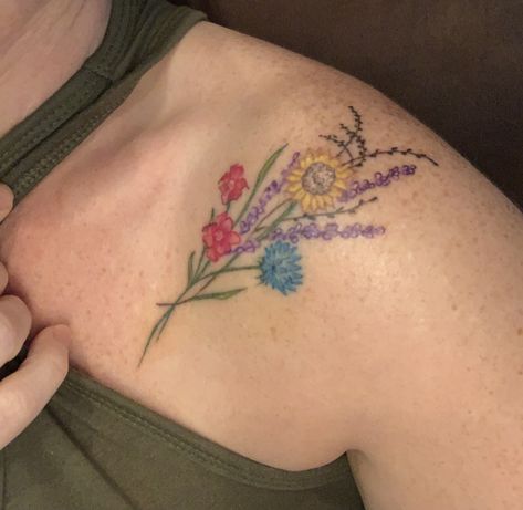 Collarbone tattoos, all color, single needle, cosmo eclipse, sunflower, and aster flowers! Color Collar Bone Tattoo, Collar Bone Tattoo Color, Colorful Collar Bone Tattoo, Sunflower Collar Bone Tattoos For Women, Watercolor Flower Tattoo Collarbone, Aster Flower Tattoos, Wildflower Tattoo, Aster Flower, Collar Bone Tattoo