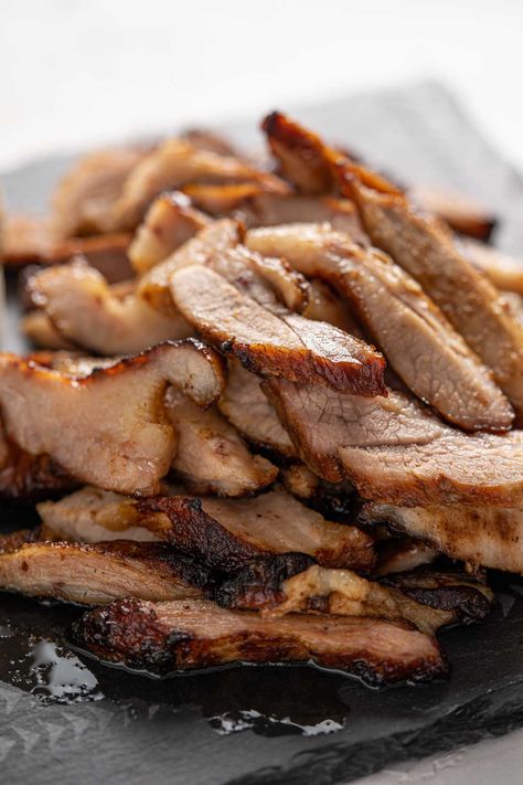 This Thai style grilled pork neck or grilled pork jowl is super DELICIOUS and easy to make. Pair it with sticky rice and nam jim jaew (Thai chili dipping sauce) and I guarantee that you’ll be satisfied! #thaigrilledporlneck #thaigrilledporkjowl #grilledpork #thaifood #thairecipe #kormooyang #kormooyaang #isanfood #namjimjaew #stickyrice #thaichilisauce #อาหารอีสาน #อาหารไทย #คอหมูย่าง #น้ำจิ้มแจ่ว Pork Neck Recipe, Chili Dipping Sauce, Thai Chili, Sticky Rice, Grilled Pork, Pork Chop Recipes, Pork Dishes, Easy Dishes, Grilled Meat