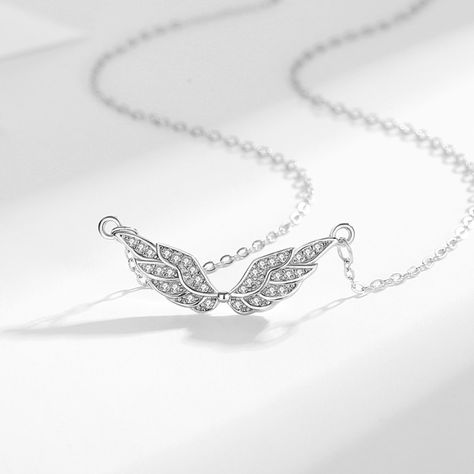 Embrace Celestial Charm With This Stunning Angel Wings Pendant Necklace. The Angel Wings Design Symbolizes Protection, Guidance, And Spirituality, Making It A Meaningful And Cherished Accessory. The Pendant Features An Array Of Sparkling Cubic Zirconia Stones Meticulously Set In A Pave Style, Creating A Captivating Shimmer That Catches The Light From Every Angle. Crafted From Genuine 925 Sterling Silver, This Necklace Guarantees Durability And Tarnish Resistance Necklace Length: 15" + 1.5" Exten Feather Fairy, Angel Wings Pendant, Angel Wings Design, Wings Pendant, Excel Shortcuts, Angel Wing Pendant, Wings Design, Gold Jewelry Necklace, Silver Feather