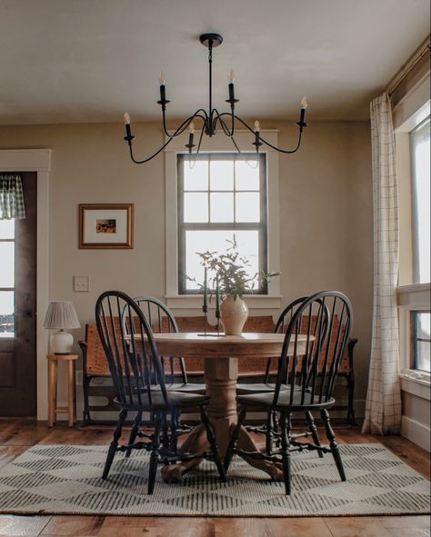 Black dining room, chairs, wood dining room table Moody Dining Room, Magnolia Room, Castle Collection, Cottage Dining Rooms, Oven Cleaner, Vintage Dining Room, Cottagecore Decor, Farmhouse Dining Room, Magnolia Homes