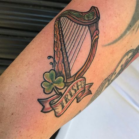 Irish Harp and Shamrock Tattoo | Tattoo Ideas and Inspiration Irish Harp Tattoo, Ireland Tattoo Ideas, Tattoo Irish, Harp Tattoo, Shamrock Tattoo, Wolf Tattoos For Women, Ireland Tattoo, Clover Tattoo, Shamrock Tattoos