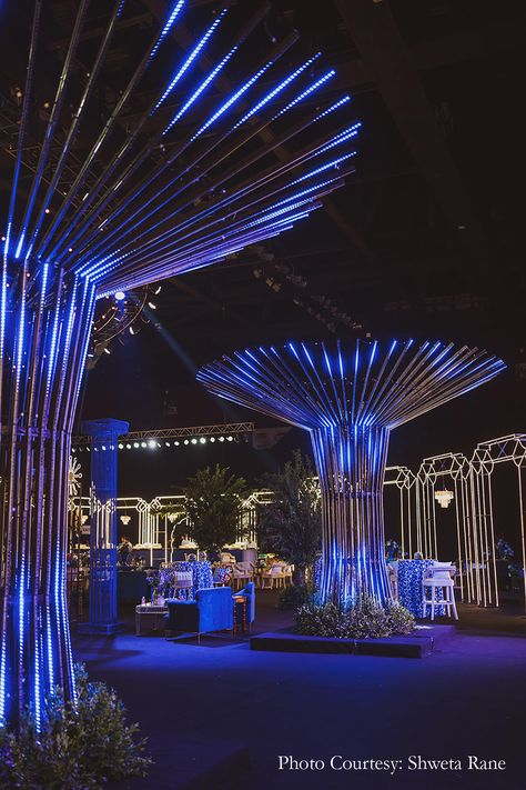 Larger-than-life with stunning LED installations and a retro vibe, this couple’s sangeet set the bar high with its elegance and glamour Led Stage Design Events, Event Set Up Ideas, Futuristic Stage Design, Sangeet Theme Ideas, Sangeet Decor Ideas, Sangeet Setup, Unique Event Decor, Amazing Wedding Ideas, Sangeet Decor