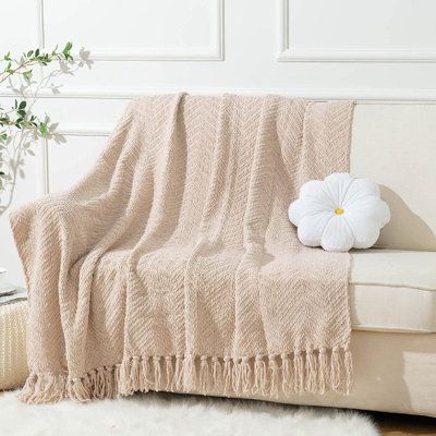 This knitted tweed throw is irresistibly soft and has a versatile design that can be used all year round. It is lightweight making it great for summer and easy transportation between rooms. Yet, it is still hardy and cozy enough to layer during chilly winter months. Color: Beige | Gracie Oaks Fher Throw in White, Size 56.0 W in | Wayfair Beige Throw Blanket, Tan Throw Blanket, Neutral Throw Blanket, Neutral Throw, Beige Throws, Boho Throw Blanket, Boho Blanket, Affordable Bedding, Chenille Throw