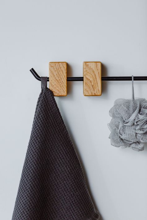 Towel holder created by Graw furniture - a combination of minimalistic and modern design and high functionality. This wall towel hanger can be used in several variations: the oak bracket can be moved and fixed as you like and need (take a look in product video), dividing the towel rack into several compartments; the metal rod of the towel holder is curved at one end, providing a possible hanger function. Mounted Towel Rack, Minimal Modern Design, Decorating Bathroom, Towel Holder Bathroom, Wine Glass Holder, Bar Wall, Towel Hanger, Product Video, Hanging Racks