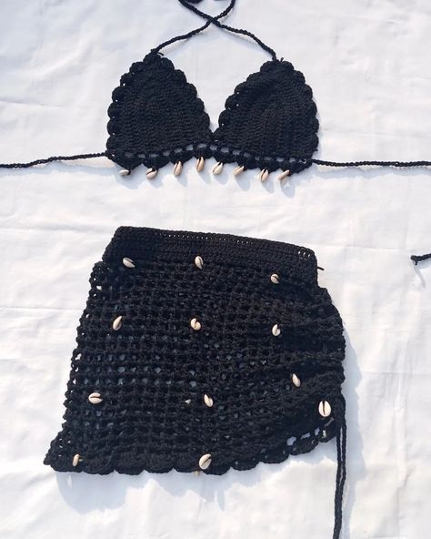 Crochet two piece set with cowrie shells @1200ksh #crochetbikiniset #beachoutfitideas #fashion Crochet Beach Set, Crochet Sets, Crochet Two Piece, Crochet Bralette, Cowrie Shells, Crochet Set, Crochet Skirt, Cowrie Shell, Black Crochet