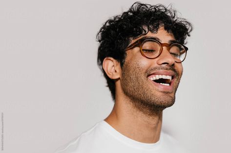 Happy Hispanic Man In Glasses Laughing by BONNINSTUDIO Male With Glasses, Colombian Men, Smile Photos, Waterfront Condo, Male References, 100 Faces, Circle Glasses, Spanish Men, Hispanic Men