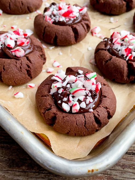 Chocolate Mint Thumbprint Cookies Peppermint Thumbprint Cookies, Peppermint Hot Cocoa Cookies, Chocolate Coconut Slice, Cranberry Cheesecake Bars, Chocolate Caramel Slice, Chocolate Thumbprint Cookies, Hot Cocoa Cookies, Peppermint Hot Cocoa, Thumbprint Cookies Recipe