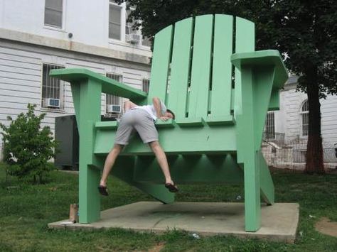 taking a seat on the giant adirondack chair- or at least trying to #ridecolorfully Oversized Outdoor Chair, Giant Adirondack Chair, Giant Chair, Activation Ideas, Furniture Build, Garden Archway, Adirondack Chair Plans, Brand Activation, Lawn Chair