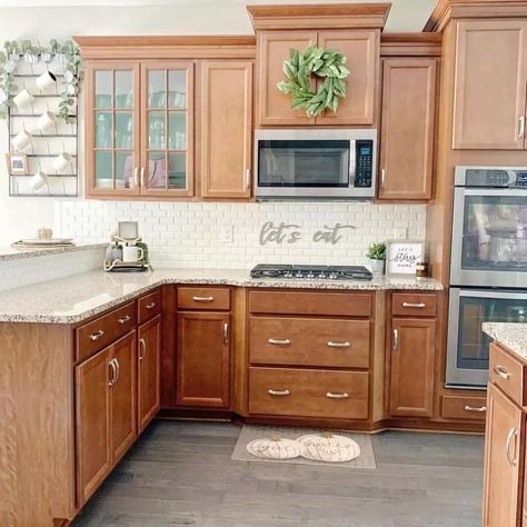 Mixed Wood Cabinets Kitchen, Updated Kitchen With Brown Cabinets, Stained Kitchen Cabinets Tile Floor, Unpainted Wood Kitchen Cabinets, Kitchen Remodel Keeping Wood Cabinets, Light Cherry Wood Kitchen Cabinets, Stained Cabinets With White Countertops, Traditional Kitchen Cabinets Wood, Stained Cherry Kitchen Cabinets