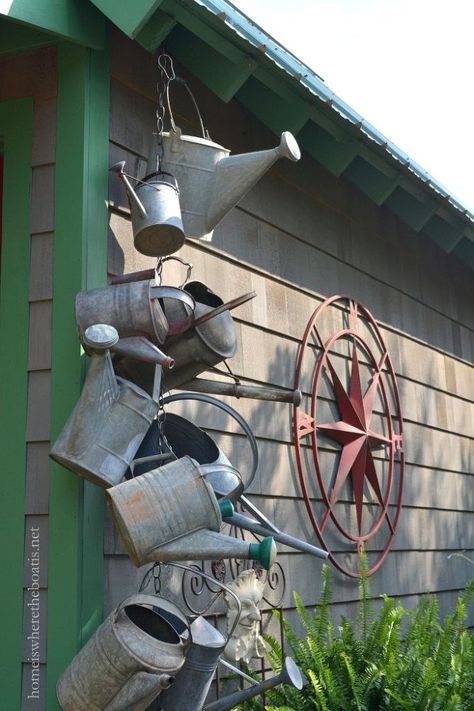 I think something similar and equally stunning could be made with old rusty lanterns. Cottage Shed, Garden Tool Organization, Garden Tool Shed, Watering Cans, Shower Hooks, Potting Sheds, Have Inspiration, Front Porches, Shed Design