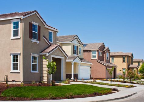 New Tract Homes. A row of new tract houses in a residential subdivision , #Aff, #row, #Homes, #Tract, #tract, #subdivision #ad Subdivision Homes, Stucco Homes, Front Elevation Designs, Row House, House Elevation, Management Company, Garage Door, Denver Colorado, Renovation Project