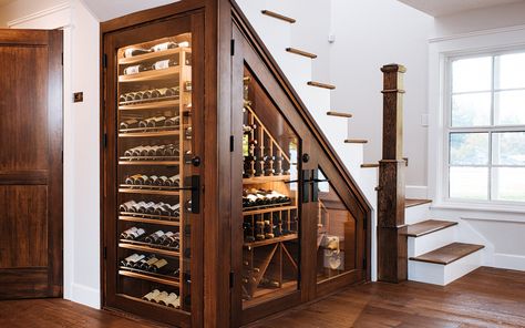 We transformed the space under the staircase of this Oregon City home into a custom home wine cellar with storage room for up to 600 bottles of wine.  Under stairs wine cellars are an easy way to carve out wine display and storage room in a two-story home without sacrificing closet space or giving a full room. Under Stairs Wine, Wine Cellar Closet, Bar Under Stairs, Under Stairs Wine Cellar, تحت الدرج, Wine Cellar Basement, Wine Closet, Home Wine Cellars, Wine Cellar Design