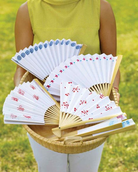 Offer charming stamped fans to your guests on hot, sunny days. Painted Hand Fans Diy, Pretty Fans, Fan Painting, Fan Craft, Diy Fans, Homemade Paper, Summer Picnics, Paper Fan, Martha Stewart Crafts