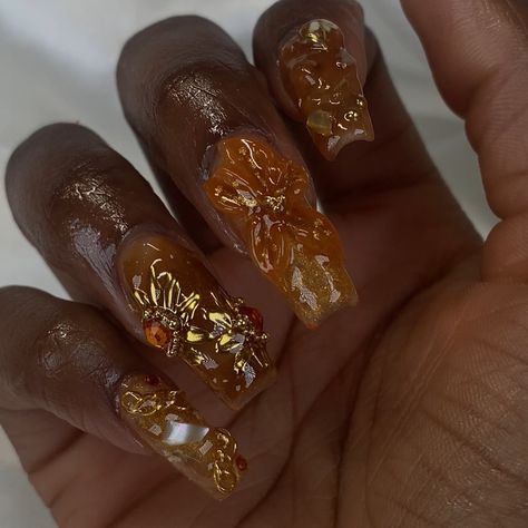 ✨🍊 Book your next nail appt today! @bratcrylix - Not able to book? Order your next custom made press on set @bratcrylix with the order form in my bio! Check "press ons" highlight for more info🤗 - Gel-x nails , burnt orange nails , nail art , flower nails , gold nails , chrome nails , nail design #atlnails #atlnailtech #atlnailsalon #atlantanails #atlantanailsalon #atlantanailtech #cummingganails #cummingganailsalon #cummingnails #cummingnailtech #alpharettanails #alpharettanailtech Oshun Nails, Gold Y2k Nails, Gold Orange Nails, Orange And Gold Nail Designs, Amber Nails Design, Burnt Orange Nails Acrylic, Orange Nails Aesthetic, Gold Flower Nails, Gold Nails Chrome