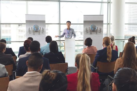 Businessman speaking in front of diverse group of business people at business seminar in office by Wavebreakmedia. Front view of young Asian businessman speaking in front of diverse group of business people at business seminar in of... #Affiliate #group, #business, #people, #diverse Business Seminar, Modern Office Building, Luxury Fonts, Business Storytelling, Business Fonts, Corporate Communication, Fonts Typography, Marketing Collateral, Business Professional