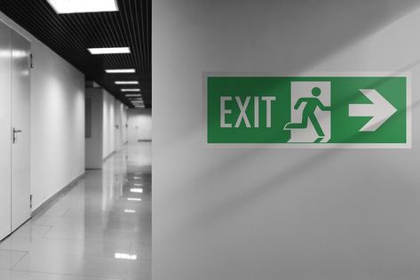 Emergency exit sign. Interior internal corridor of modern office. Corridor with light walls, black ceiling and shiny floor. Soft focus. Light Walls, Health And Safety Poster, Emergency Exit Signs, Office Corridor, Safety Poster, Adobe Photoshop Design, Safety Posters, Exit Sign, Black Ceiling