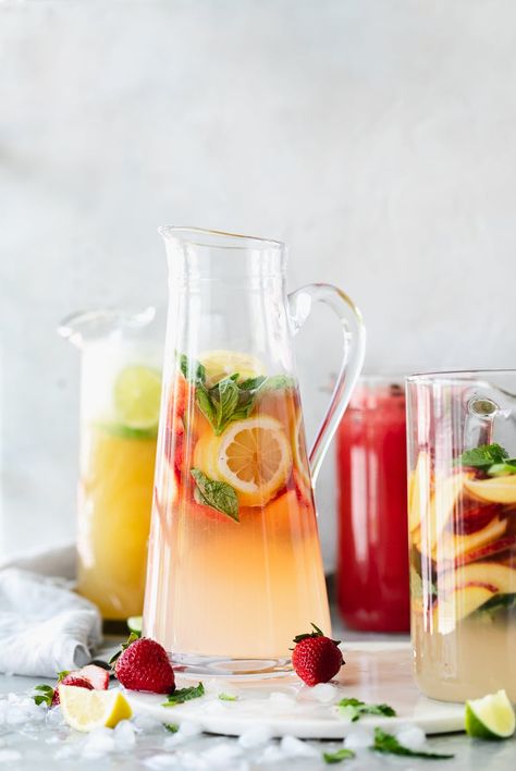 PITCHER COCKTAIL RECIPES: Classic Pitcher Margaritas, Strawberry Lemonade Basil Fizz, Peach Elderflower Gin Pitcher, and a Watermelon Mojito Mocktail Pitcher Cocktail Recipes, Pitcher Margaritas, Peach Cocktail Recipe, Pitcher Margarita Recipe, Cocktail Recipes For A Crowd, Easy Margarita Recipe, Pitcher Drinks, Pitcher Cocktails, Mojito Mocktail