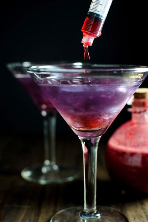 This drink will put a haunted spin on your happy hour. Inject some red grenadine with a syringe to take it to the next level.   Get the recipe at The Flavor Bender. Easy Halloween Cocktails, Flavoured Vodka, Halloween Drinks Alcohol, Witch's Heart, Halloween Cocktails, Halloween Drinks, Easy Cocktails, Witches Brew, Classic Cocktails