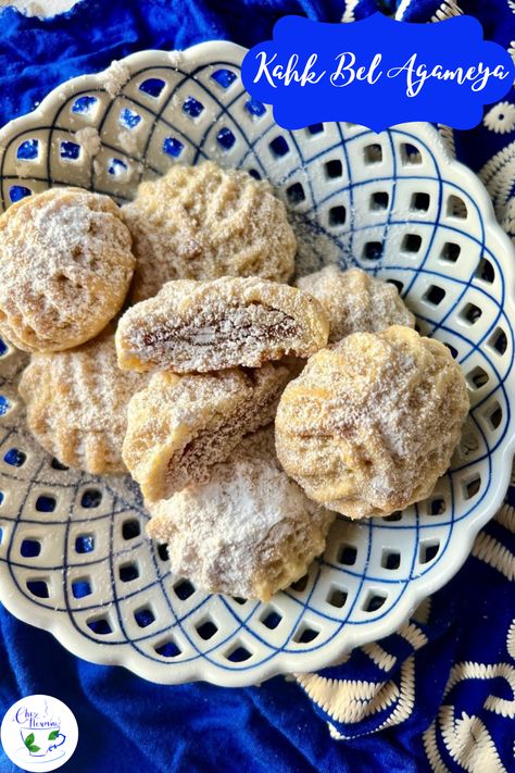 Meet the cookies that leave Egyptian religious feast tables incomplete. Kahk Bel Agameya are flaky cookies filled with Agameya, a candy like stuffing made up of ghee, flour, sesame, and nuts. The blog post linked below will take you on a step-by-step journey on learning how to make these festive Egyptian cookies. Kahk Recipe, Egyptian Cookies, Egyptian Desserts, Egyptian Food, Festive Cookies, Filled Cookies, Spice Shop, Eastern Cuisine, Recipe Boards