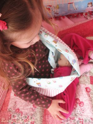 Diy Doll Sling, Baby Doll Carrier Sewing Pattern, Diy Doll Carrier, Baby Doll Car Seat, Baby Doll Carrier, American Girl Patterns, American Girl Doll Crafts, Wooden Spool, Doll Carrier