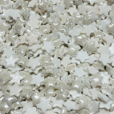 125 Pearlized Porcelain Star Cabochons Porcelain Star Cabochons, perfect for mosaic or decorative use. Size is about 7.5/8mm by 2mm thick. All white. Please look at the images. I have included a penny for size reference. Please keep in mind that these are handmade resulting in *slight* size or shape variation. I have made every effort to ensure the color in the photographs is as accurate as possible. Some colors may differ depending on your computer monitor, or screen settings. Stars pictured ar White Star Aesthetic, Mosaic Glass Art, Scranton Pa, Mosaic Supplies, Glass Stars, A Penny, Look At The Stars, Love Stars, Star Pictures