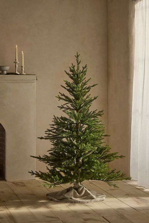 This faux Norway spruce is an essential for effortless holiday decorating that wows. Strikingly natural, each tree is modeled after a singular, unsheared specimen found deep in the woods by an adventurous design team. Every hinged tree includes a built-in metal stand and is thoughtfully made with a mix of needle and branch shapes for a remarkably realistic appearance, year after year. | Faux Norway Spruce Tree in Green, Size: Small at Terrain Norway Spruce Tree, Scandinavian Christmas Trees, Deep In The Woods, Adventurous Design, Faux Christmas Trees, Norway Spruce, Real Christmas Tree, Spruce Tree, Small Christmas Trees