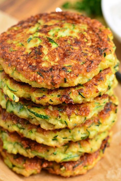 Zucchini Fritters made with fresh zucchini, Parmesan cheese, and a some Mozzarella cheese for an extra cheesy bite. It's pan fried to be crispy in the outside and soft on the inside. #zucchini #zucchinisnack #fritters #appetizer #sidedish #zucchinirecipes Vegan Zucchini Fritters, Fried Zucchini Recipes, Zucchini Fritters Recipe, Zucchini Parmesan, Fresh Zucchini, Easy Zucchini, Zucchini Fritters, Recetas Keto, Zucchini Fries