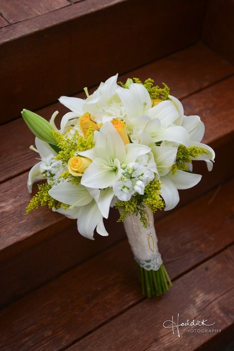 White Lilies, Roses wrapped in satin and lace with charms done by Clark County Floral and Pictures done by Hoddick Photography Yellow Lily Bouquet, White Lily Bouquet, Wedding Flower Packages, Lily Bouquet, Clark County, Church Flowers, White Lily, Flower Packaging, Ceremony Flowers