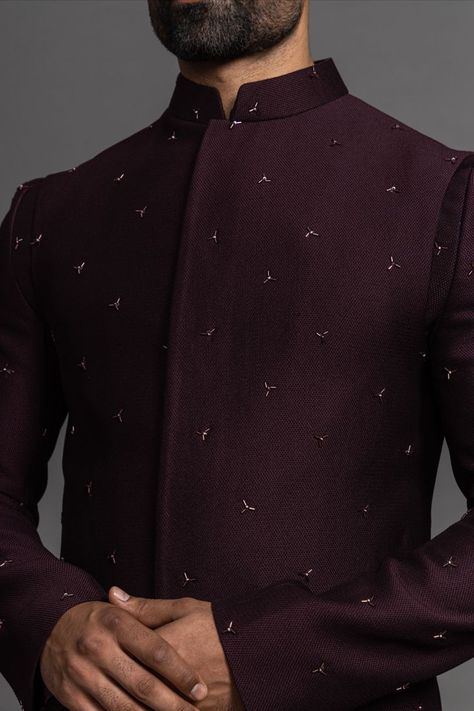 Add a layer of rich wine to your wardrobe with this Indo-western suit. Golden dots dominate the jacket, making it the eye-catching element of the outfit. 

All types of customization can be done in any colour that suits you. WhatsApp on +91 98204 74707 for customization inquiries. Traditional Indian Mens Clothing, Indian Wedding Suits Men, Indo Western For Men, Mens Traditional Wear, Sherwani For Men Wedding, Boys Kurta Design, Groom Dress Men, Wine Colour, Indian Groom Wear