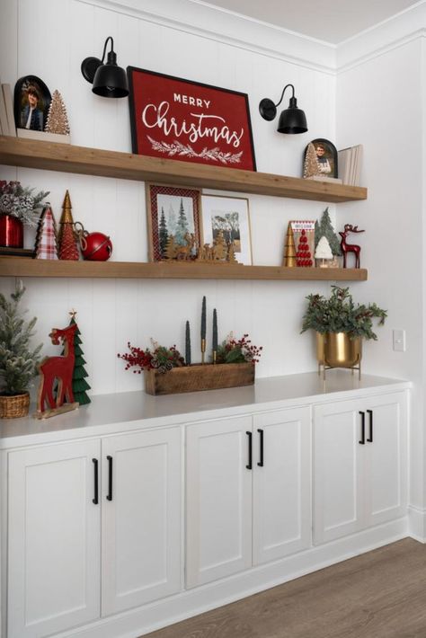 Christmas village, Christmas tree decor, mini Christmas trees, Christmas decor bookshelf, gold and red Christmas Bar Cabinet Decor, Cedar Shelves, Painted Brick Fireplace, Bar Shelves, Hearth Room, Minimalist White, Dry Bar, Nice List, Holiday Signs