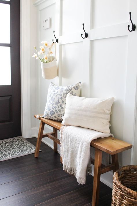 Simple Spring decorative touches in my entryway. Floral home decor. Faux Florals. Poppies. Hanging Basket. Floral Throw Pillow. Light throw blanket. Target style. Target Home. Amazon Home. Entryway Bench. Board And Batten entryway decor. Seasonal decor. Hanging Basket Entryway, Entryway Bench Hooks, Charleston Entryway, Board And Batten Entryway With Bench, Small Bench Decor, Pillow On Bench, Small Entry Bench, Spring Entryway Decor, Bench Entryway Ideas