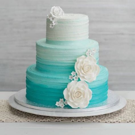 Ombre Encore cake serves 50-75 guests Publix Wedding Cake, Publix Cakes, Orange Wedding Ideas, Teal Wedding Cake, Ombre Flowers, Wedding Ideas Outdoor, Peacock Wedding Cake, Wedding Cake Ombre, Outdoor Wedding Ideas