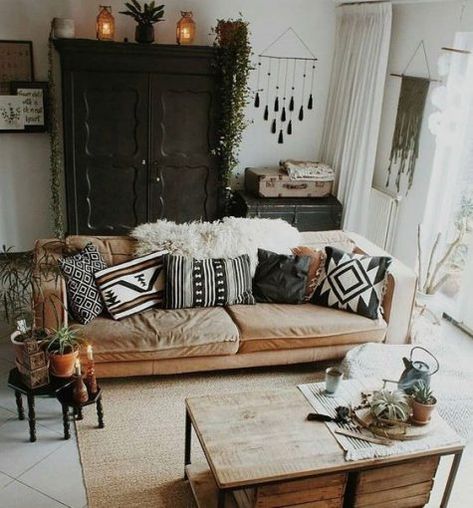 a monochrome boho living space with a wahsed out sofa, black vintage furniture, a pallet wood cofeee table, folksy pillows and tassels Pillows And Blankets, Design Salon, Creating Texture, Hippie Home Decor, Bohemian Living, Bohemian Living Room, Style Deco, Room Decorating, Boho Interior