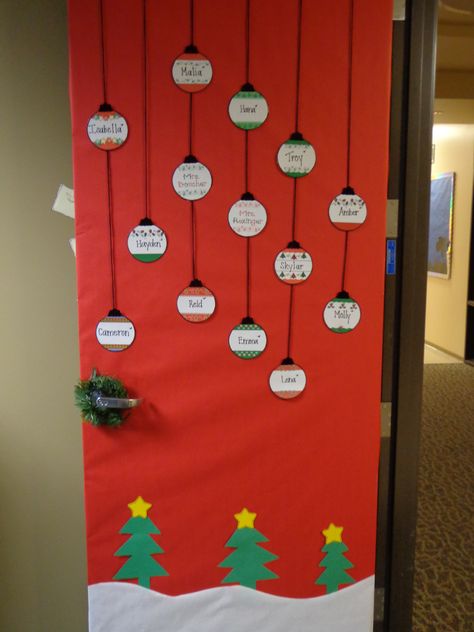 Decorated my classroom door. Each ornament displayed my student's names Ornament Door Decoration, Door Decorations Classroom Christmas, Christmas Doors, Classroom Christmas Decorations, Preschool Christmas Activities, Classroom Goals, Christmas Name Tags, Classroom Doors, Name Decorations