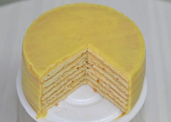 This recipe for lemon cheesecake by the Southern chef Edna Lewis was featured in a Times article about Southern cakes It is a lovely layer cake that makes economical use of yolks and whites, and it’s nothing like what a New Yorker thinks of as cheesecake The “cheese” is really an eggy lemon curd piled between layers of cake made sturdy by egg whites.  Picture is of one of Dean's since  NYTimes didn't have a picture. Southern Lemon Cheese Layer Cake, Lemon Doberge Cake Recipe, Lemon Cheese Layer Cake, Seven Layer Cake, Edna Lewis Recipes, Doberge Cake, Southern Brunch, Southern Cakes, Southern Deserts