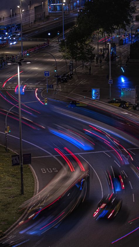 A busy street in Barcelona at night. The photo is taken with long exposure, to get the motion blur. The cars are now only a light string and not really to be seen. Long Exposure Car Photography, Light Trails Photography, Blue Aesthic, Aesthic Pictures, Long Exposure Photography Night, Transport Photography, In Motion Photography, Collection Moodboard, Light Trail Photography