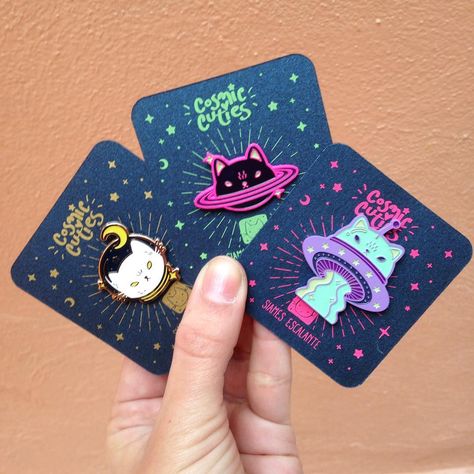 My paper supplier discontinued my beloved holographic paper  I had to make new backing cards for my pins. They're sparkly tho  remember to click the link in my bio to purchase! Pin Card Design, How To Make Enamel Pins, Pin Ideas Button Diy, Backing Card Design, Pin Backing Card, Holographic Paper, Pins And Buttons, Enamel Pin Collection, Jacket Pins