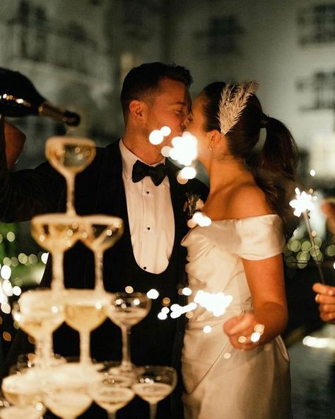 International Wedding Planner on Instagram: "Champagne tower with a side of sparkle? I mean 🥂is there anything else #photo @storyofeve #venue @merrionhotel #mua @cloochy #hair @matthewfeeney_hair #bridal @viviennewestwood #planner @tarafayevents #christmas #christmasdecor #christmaswedding #viviennewestwood #merrionhotel #sparklers #champagne" Sparkler Photography Wedding, Wedding Photo Ideas Sparklers, Wedding Photo With Sparklers, Wedding Photography Sparklers, Champagne Tower Wedding Photo, Champagne Tower, Champagne Wedding, Wedding Photography Poses, Wedding Mood Board