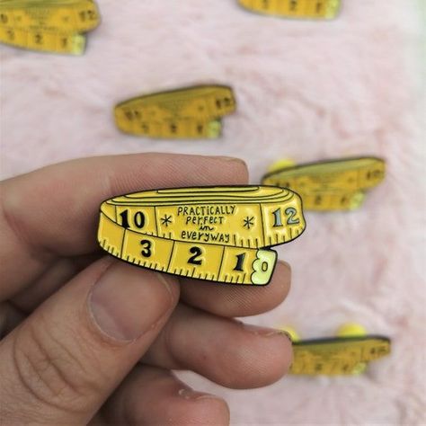 Enamel tape measure lapel pin. Perfect gift for engineers, architects, construction workers, or anyone who loves measuring! #tapemeasurepin #lapelpin . #Mary_Poppins #Enamel_Pin_Packaging #Pin_Packaging #Label_Pin Label Pin, Jacket Pins, Iron On Embroidered Patches, Practically Perfect, Soft Enamel Pins, Enamel Lapel Pin, Bff Gifts, Soft Enamel, Hard Enamel Pin