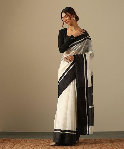 If the quiet luxury era has anything to say, it's that perennial styles like an iconic black and white saree will forever have a spot in our hearts and in our wardrobes.� Featured here is our White Handloom Pure Silk Chanderi Saree With Black Mashroo Border. This saree with its 'Ek Naliya' weave offers a delicate texture that gracefully envelops the wearer.� Explore our new edit of Chanderi Sarees online at www.weaverstory.com or at our stores For appointments, Call/ Whatsapp: +91 981064634... White And Black Saree, Black And White Saree, Chanderi Sarees, Chanderi Saree, Simple Sarees, White Saree, Aishwarya Rai Bachchan, Five Senses, Black Saree