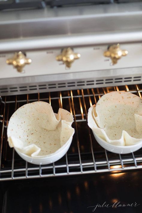 Easy Homemade Taco Salad Bowls made in the oven in just a few minutes. Impress dinner guests with this effortless baked flour tortilla made into fun Taco Bowls. #tacobowls #tacosalad #cincodemayo Tortilla Bowls Baked, Homemade Taco Salad, Taco Shell Bowls, Taco Salad Shells, Baked Taco Shells, Oven Baked Tacos, Oven Tacos, Tortilla Bake, Taco Salad Bowls