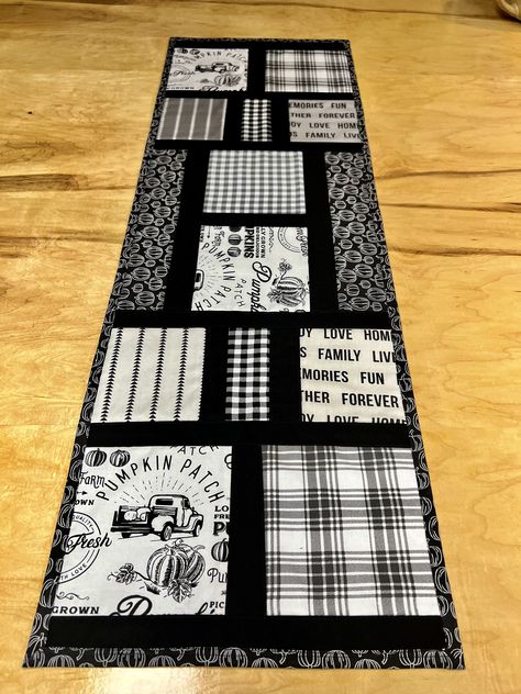 "Quilted Fall Table Runner Measuring 37\" long, 12 1/2\" wide. Rustic Black & White Fall, Plaid & Pumpkins Design. Wonderful Housewarming Gift or a Perfect Addition To Your Dining Table, Kitchen Island or Coffee Table.  Colors may vary slightly depending on your computer screen. Wash on Gentle Cycle/Cold Water or Hand Wash. Tumble Dry on Low or Recommended Air Dry to Reduce Shrinkage. Lightly press with iron to give a crisp finish. Expect 2-3 % Shrinkage On The 1st Wash As This Item Has Not Been Homemade Table Runners, Black And White Table Runner, Plaid Pumpkins, Dining Table Kitchen Island, Coffee Table Runner, Quilt Blocks Easy, Fall Table Runner, Rustic Table Runners, Modern Table Runners