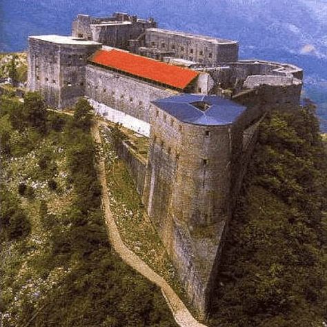 Haiti's The Citadelle Laferrière  The Citadel the largest structure in the Western Hemisphere at the time it was build, it was the first monument built by slaves after they had won their freedom. Its a popular tourist destination. Bring your hiking shoes and lots of water if you plan on visiting this mammoth fortress. There’s a seven mile hike (all uphill) that’s not for the faint at heart. Haiti History, Star Fort, Haitian Flag, Chateau France, Santa Lucia, A Castle, Medieval Castle, Amazing Places, Unesco World Heritage Site