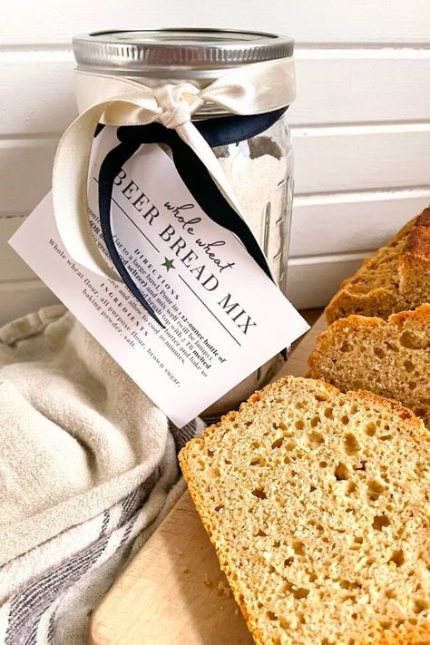 Whip up a batch of this mouth watering beer bread mix with whole wheat in minutes for a recipe that is not only quick, but also packed with extra nutrients. Give this jar gift to a friend or family member who loves to bake along with a bottle of beer (or non-alcoholic beer or soda water) - all they need to add is a brushing of butter to enjoy their warm, homemade bread. Plus, the downloadable tags are included, too! Beer Bread Mix, Bread Gifts, Flavored Beer, Non Alcoholic Beer, Wheat Beer, Beer Bread, Soda Water, Bread Mix, How To Make Beer