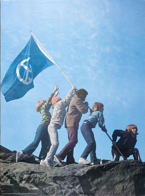 Poster has a photograph of five children raising a blue and white flag with a peace symbol overall. One child at right is crouched at the base of the flagpole while the other four are in a line on the other side of the pole helping to raise it up. The background is dominated by blue sky. Mother Earth Father Sky, Blue And White Flag, Peace Flag, White Flag, A Flag, Cultural Identity, Raising Kids, Mother Earth, The Other Side