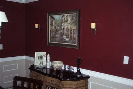 An example of Behr Velvety Merlot done in a dining area, pictures of the paint color on walls shows much more red hues than the paint swatch Burgundy Walls Living Room Ideas, Behr Maroon Paint Colors, Burgundy Hallway Ideas, Maroon Painted Walls, Maroon Wall Color, Merlot Paint Color, Maroon Wall Paint, Den Paint Colors Ideas, Maroon Paint Colors