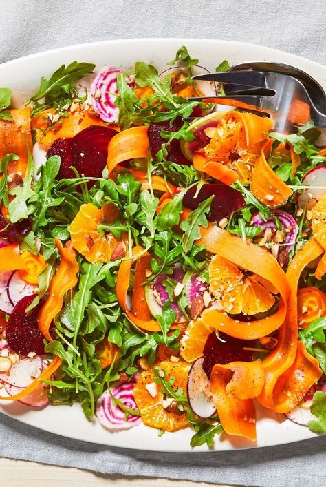 Leah Koenig's Shaved Beet and Carrot Salad with Citrus Scallion Dressing juxtaposes juicy clementines against crisp ribbons of carrot and crunchy root vegetables. Carrot Salad Dressing, Beetroot And Carrot Salad, Great Salad Recipes, Best Salad Recipes, Salad With Sweet Potato, Carrot Salad, Beet Salad, Sugar Snap Peas, Arugula Salad